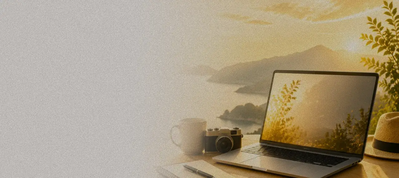 A laptop and camera ready for connected travel